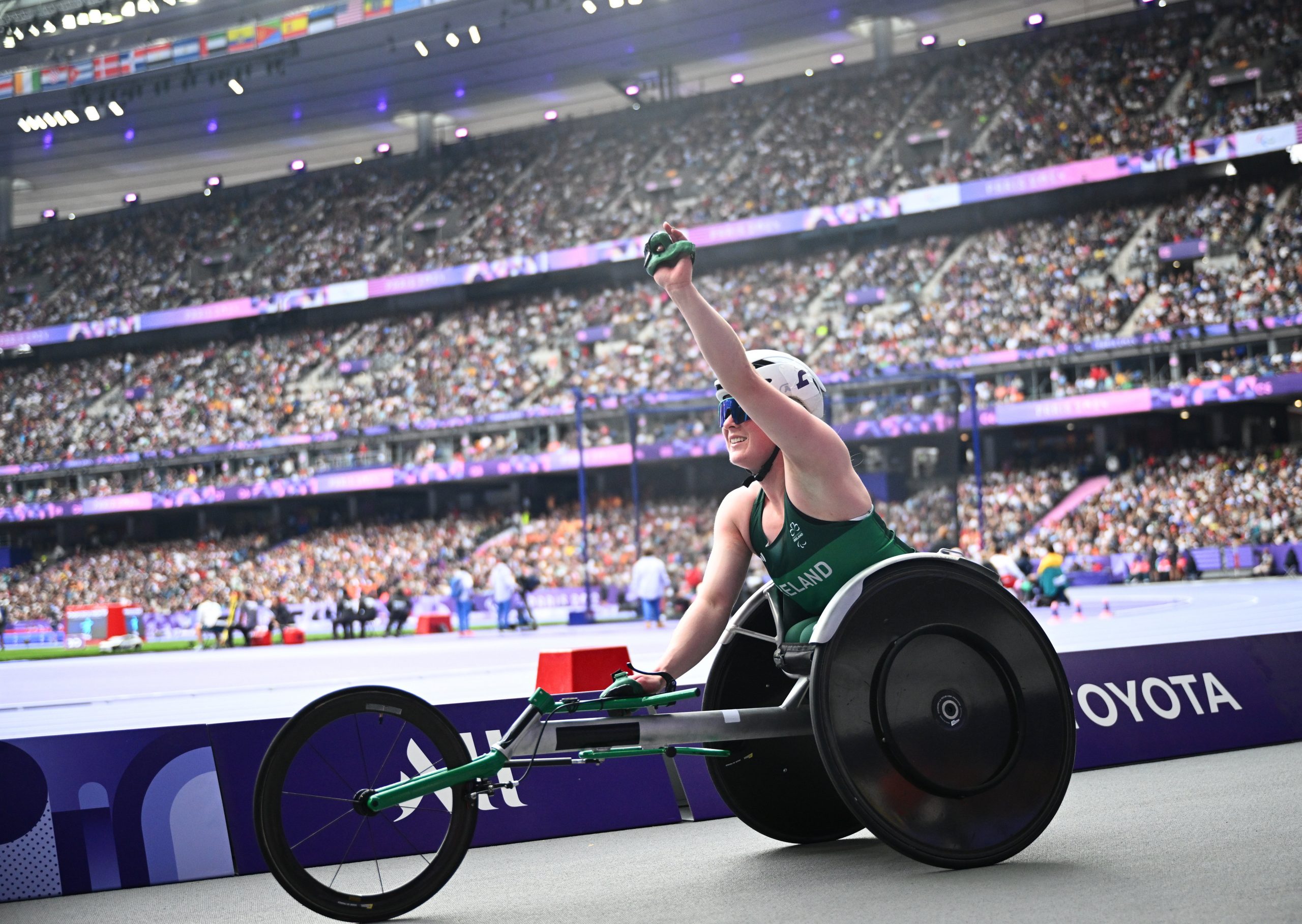 Shauna Bocquet waves to a large crowd