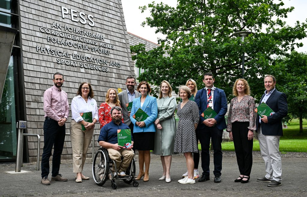 Paralympics Ireland representatives, researchers and public officials pose for a group photo outside the University of Limerick Physical Education and Sport Sciences Building during the launch of the Gateways & Pathways para sport research project.