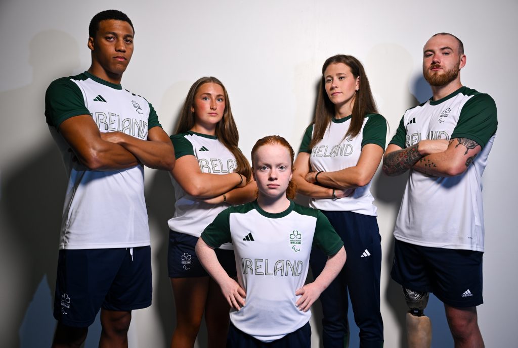 from left, Deaton Registe, Síomha Nic Brádaigh, Dearbhaile Brady, Róisín Ní Ríain and Barry McClements pictured at Sport Ireland Institute on the National Sports Campus in Dublin. All wearing Ireland kit white t shirt with IRELAND written on the front. Looking serious at camera. Grey background