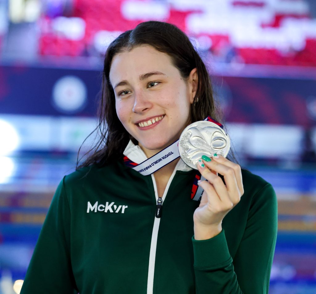 RRóisín Ní Ríain of Team Ireland with her silver medal after the Womens 100m Breaststroke SB13 final during day two of the Toyota World Para Swimming Championships at the OCBC Aquatic Centre in Singapore. Smiling holding medal.