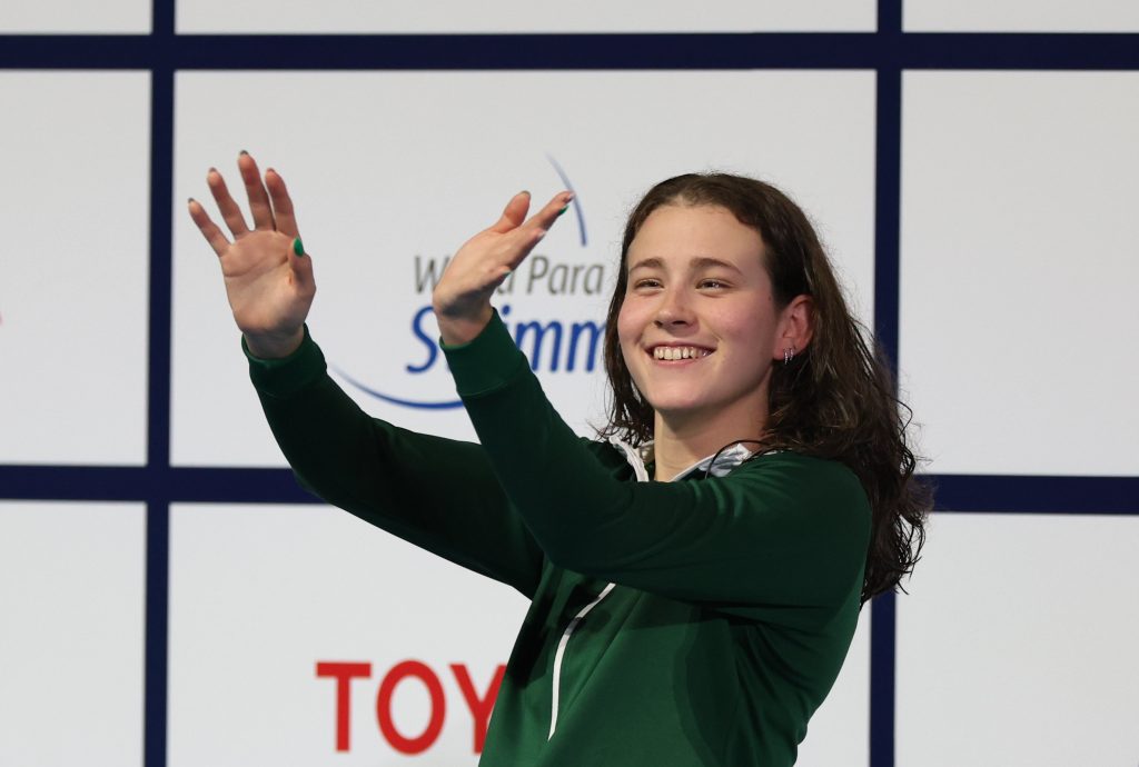 Róisín Ní Ríain of team Ireland waving to the crowd after winning silver in Singapore