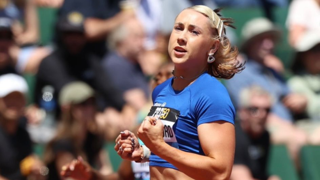 Orla Comerford, wearing blue, of Ireland runs in the women’s Para athletics 100m mixed classification race at the Prefontaine Classic in Eugene, Oregon.